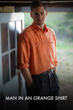 Man in an Orange Shirt